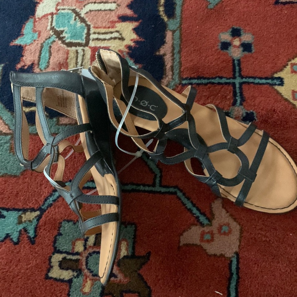 Boc black leather gladiator sandals. Size 7 zip back. Slight heels.